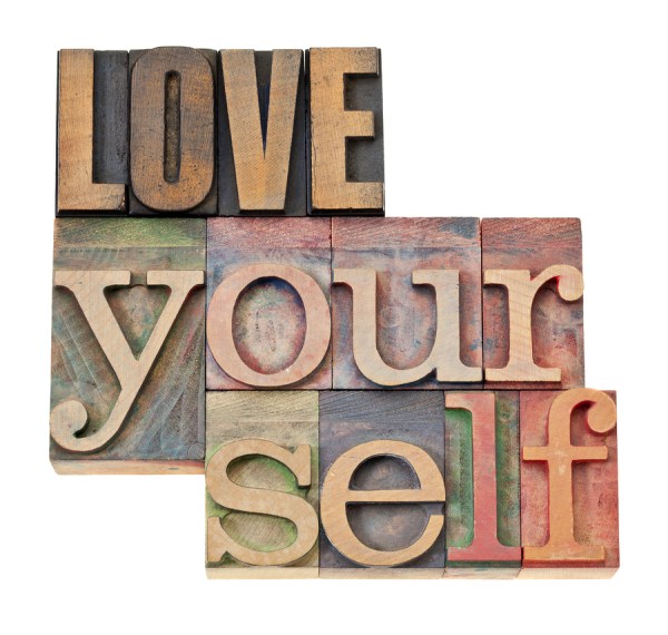 love yourself - self esteem concept - isolated text in vintage l
