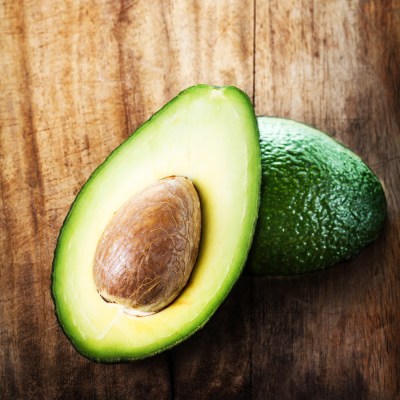 A Sliced Avocado On A Cutting Board